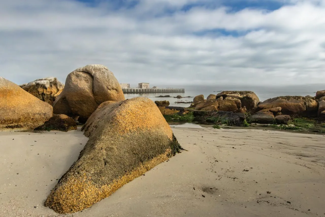 Granite boulders on the beach, in colour